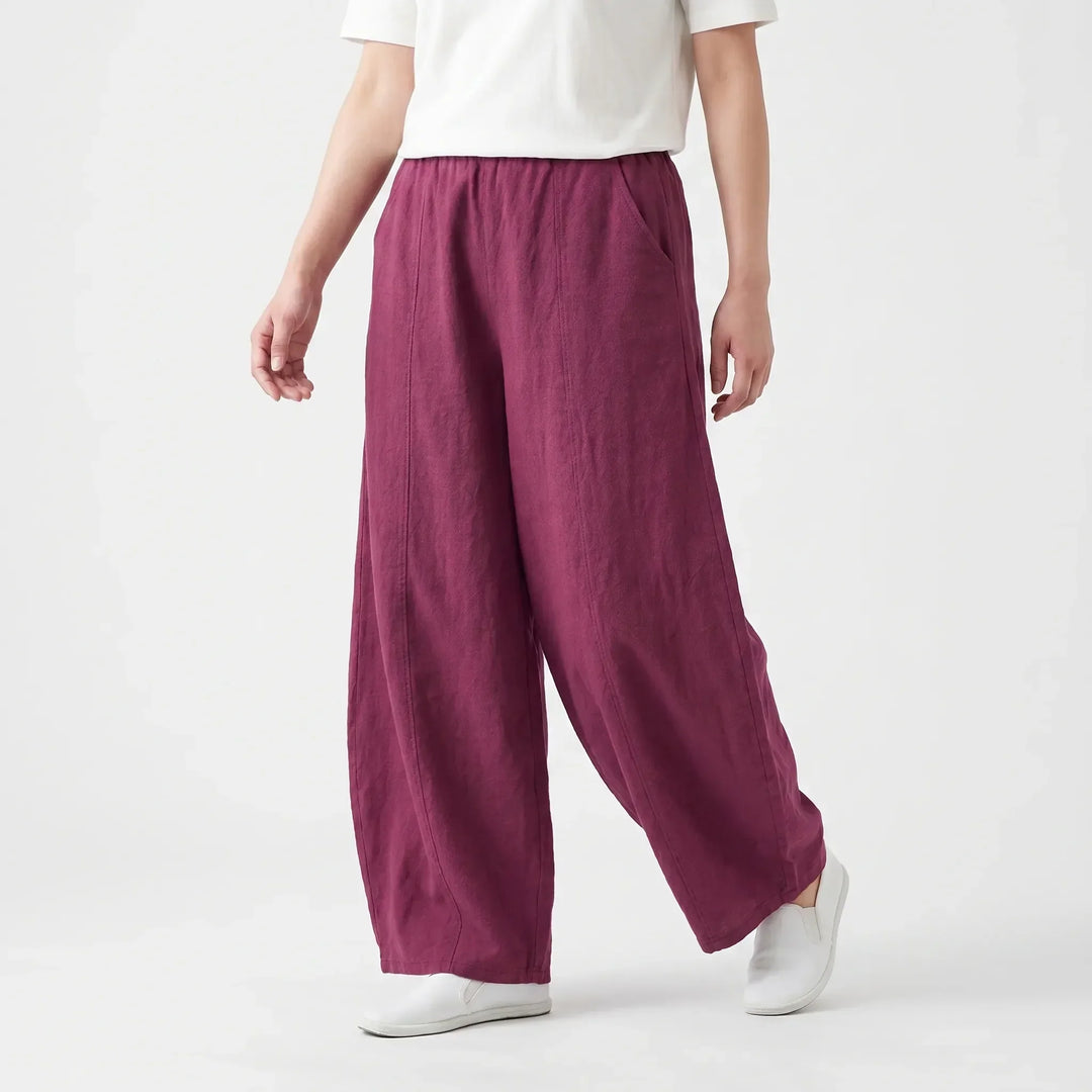 Comfy women's relaxed fit barrel trousers with wide leg & elastic waist for effortless everyday wear.
