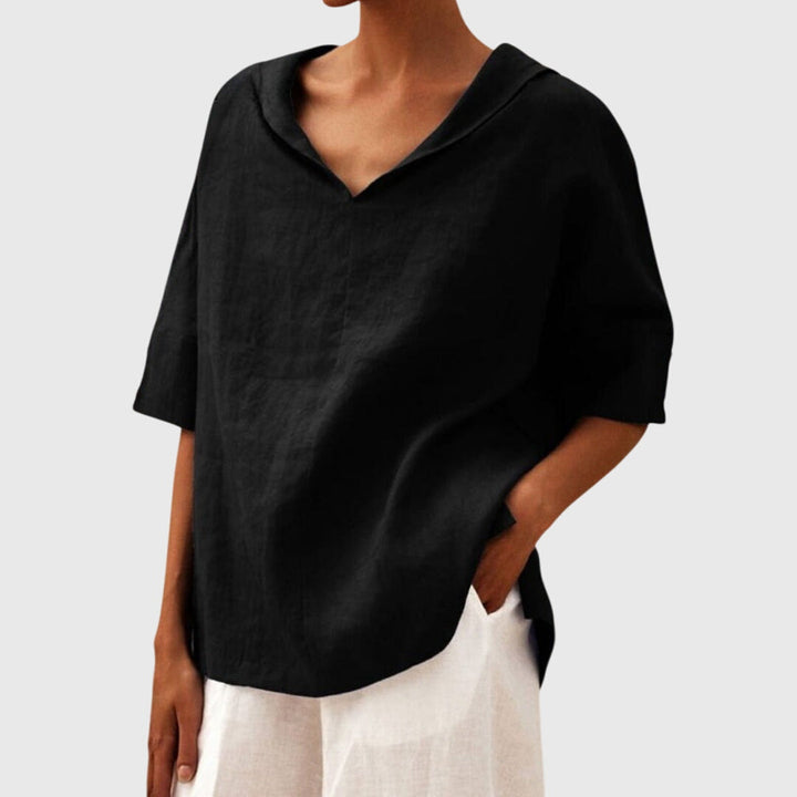 Women's relaxed fit blouse for effortless everyday style. Comfortable long sleeve casual top.