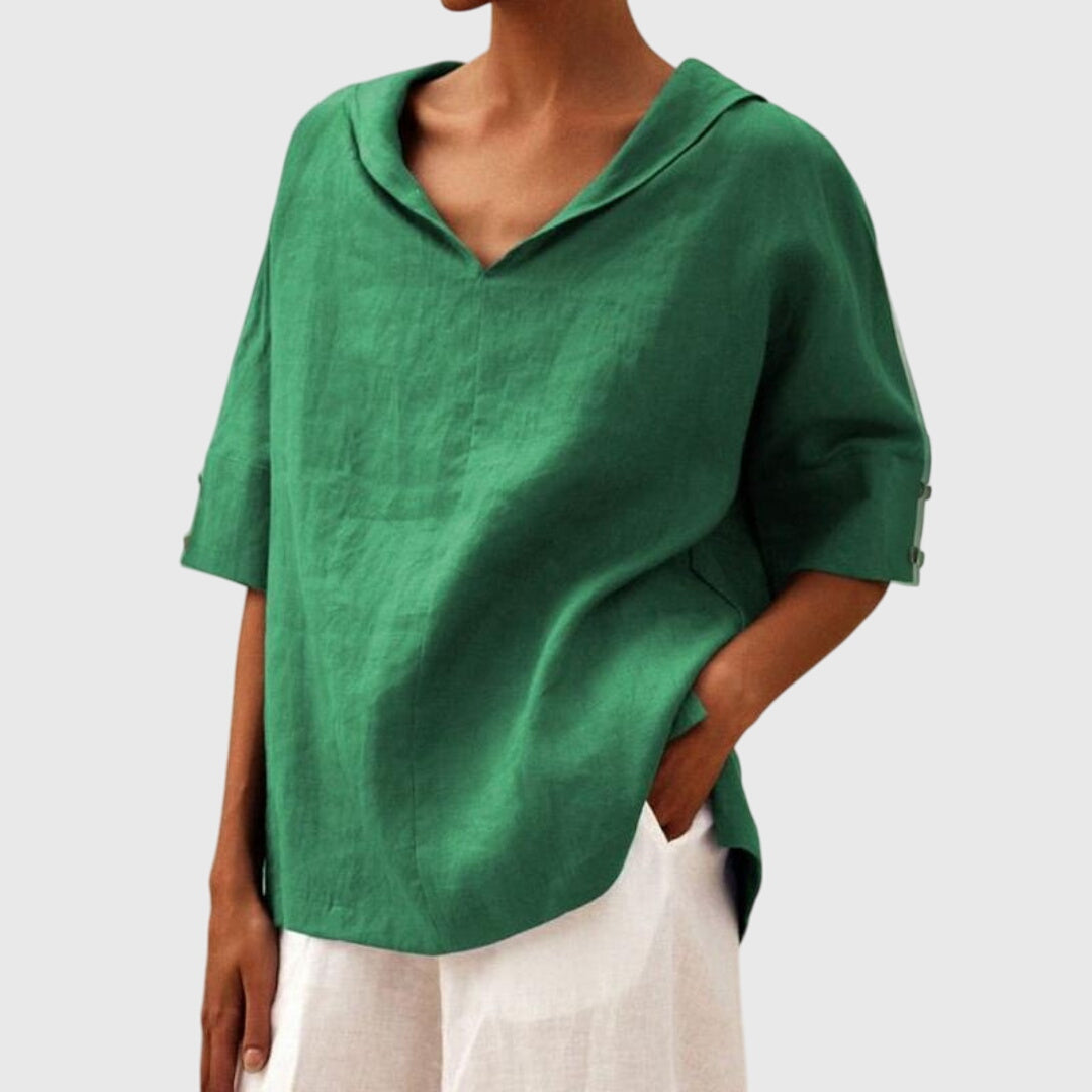 Stylish women's relaxed fit blouse, a comfortable and versatile long sleeve top for everyday fashion.