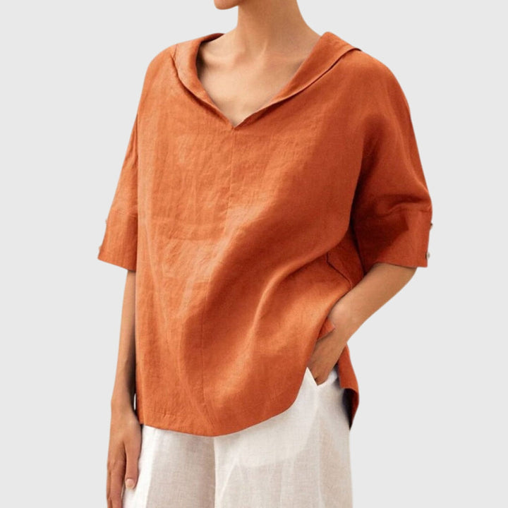 Versatile women's loose blouse, designed for comfort and everyday wear. Relaxed fit long sleeve top.