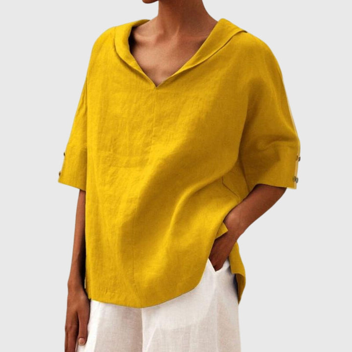 Effortless women's relaxed fit long sleeve blouse. A comfortable, chic casual top for everyday style.