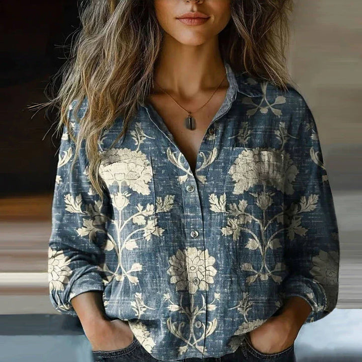 Unique women's blouse with a relaxed bohemian fit and colorful vintage print, great for free-spirited style.
