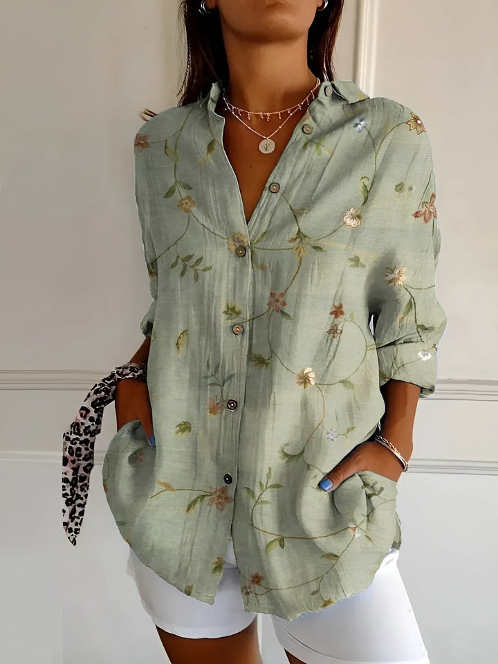 Women's relaxed fit button-down blouse with long sleeves, perfect for casual elegant everyday fashion or office wear.
