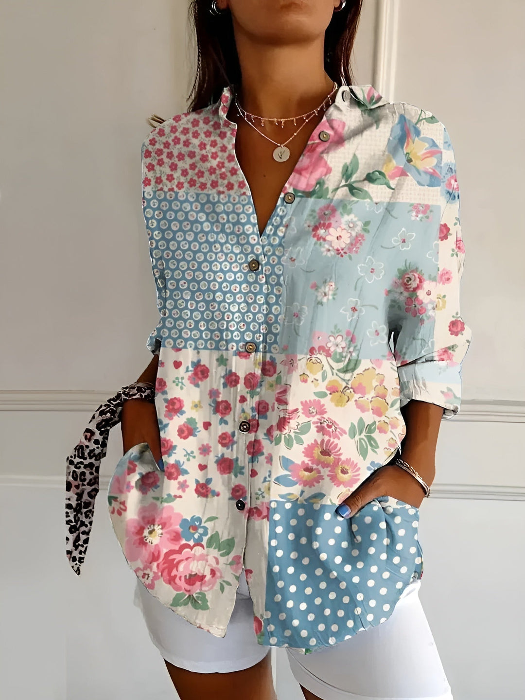 Chic women's V-neck button-down blouse in a relaxed fit, a versatile long sleeve top for modern wardrobes.
