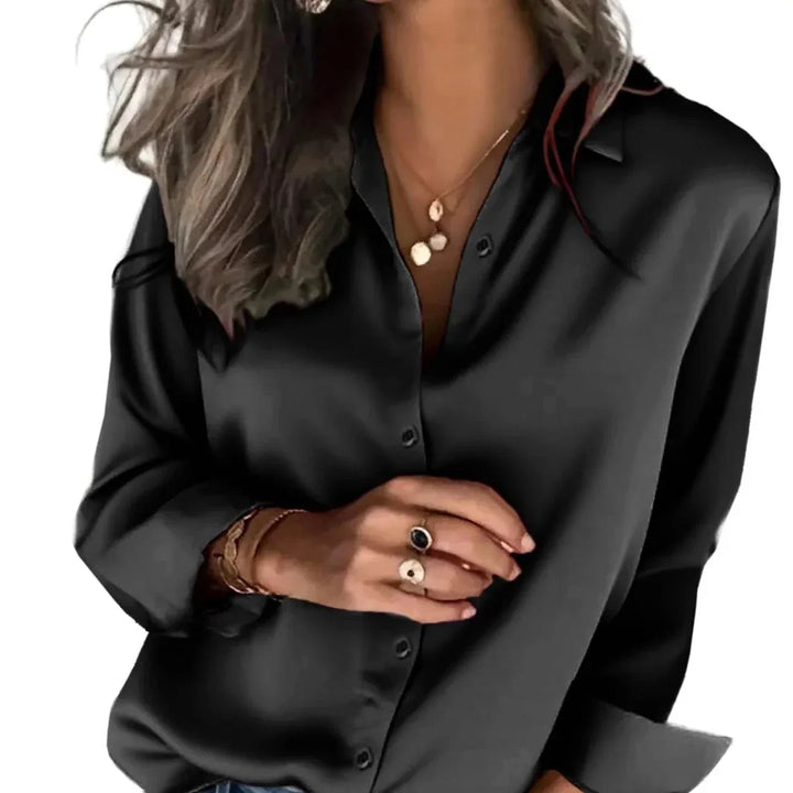 Chic women's button down blouse, relaxed fit long sleeve top, versatile for everyday or office elegance.
