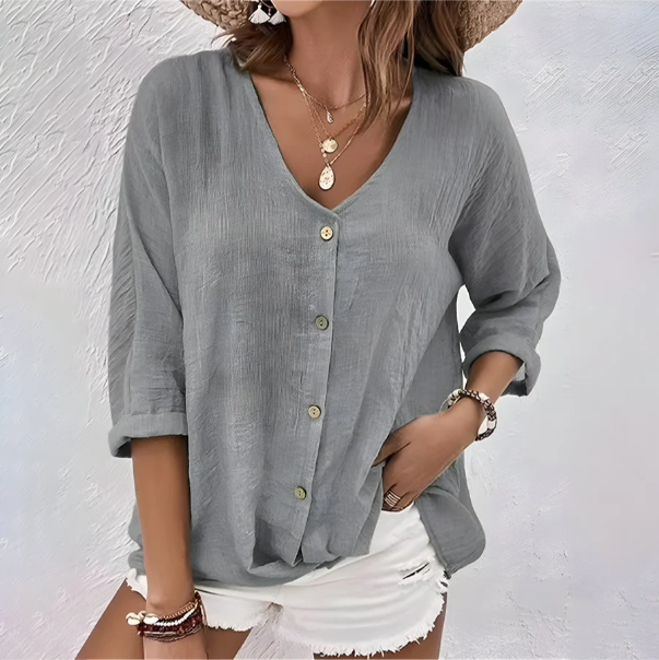 Effortless women's relaxed fit blouse with button-up front. Versatile for everyday style, spring & summer.
