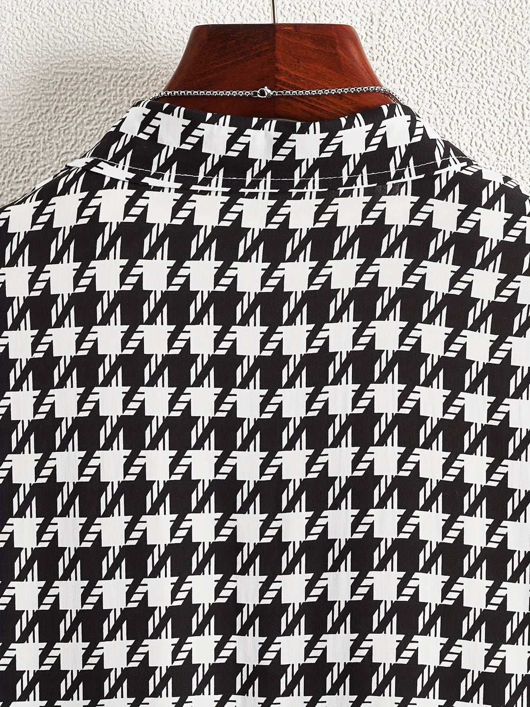 Elegant floral print button-up shirt for women. Cotton blend, long sleeve, chic and versatile style.