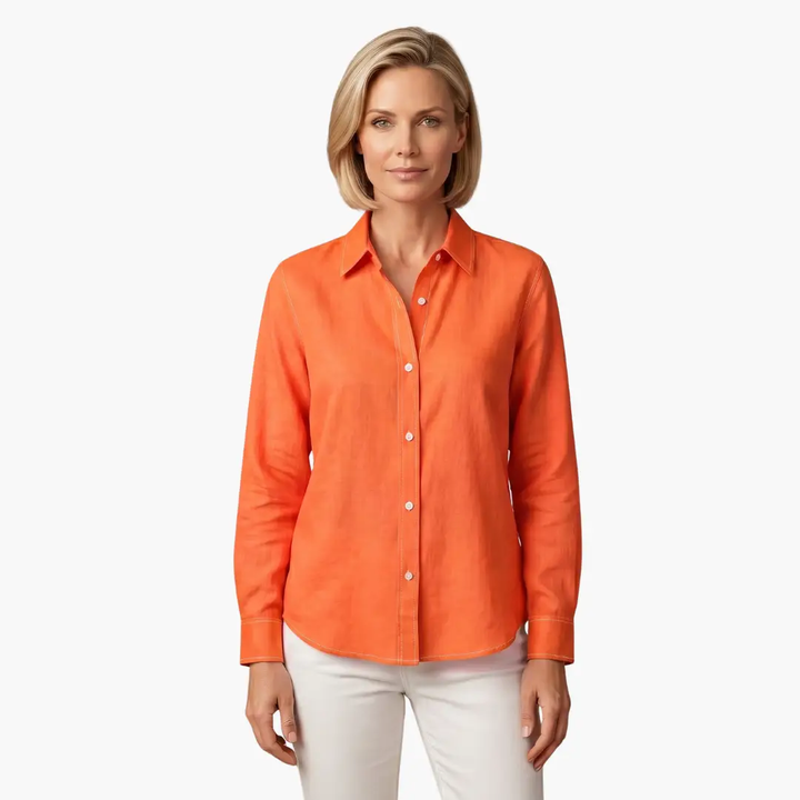 Comfortable women's oversized button-up shirt with long sleeves, perfect for a relaxed, easygoing style.