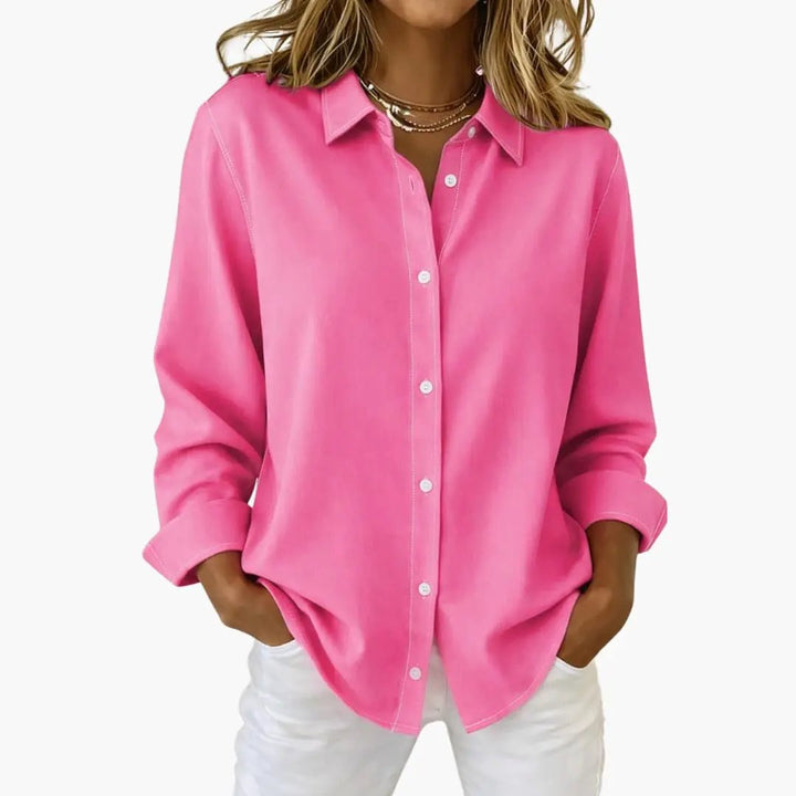 Versatile women's button-up blouse, a wardrobe staple, suitable for office wear or casual outings.