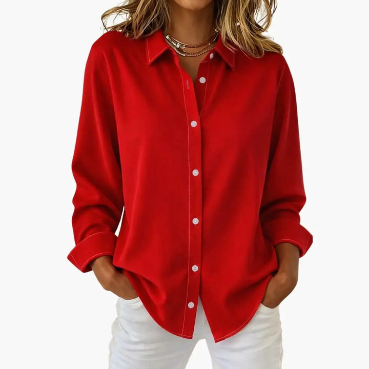 Wardrobe staple: women's relaxed fit long sleeve casual shirt with a full button-up front.