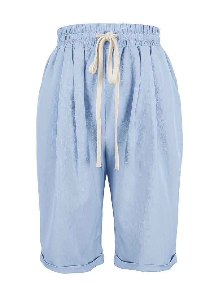 Casual women's capri pants, lightweight & breathable, with elastic waist for relaxed summer style.