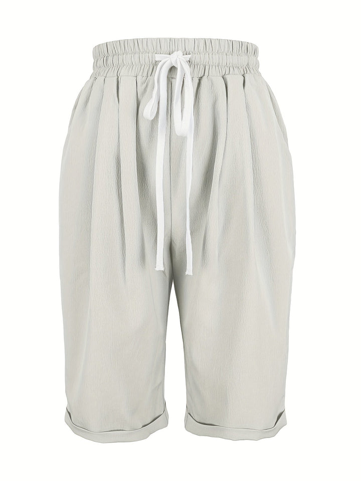 Women's lightweight cropped trousers, mid-calf length, with a comfortable elastic waistband. Great for summer.