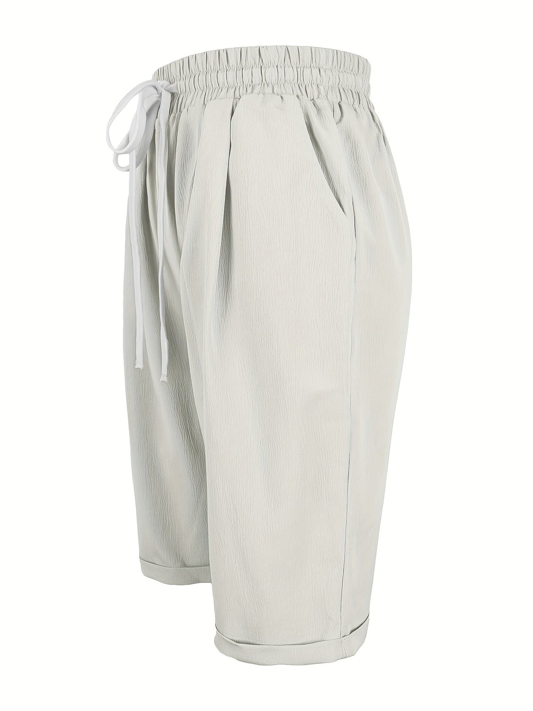 Relaxed fit women's capri trousers with a comfy elastic waist. Lightweight fabric, perfect for warm weather.