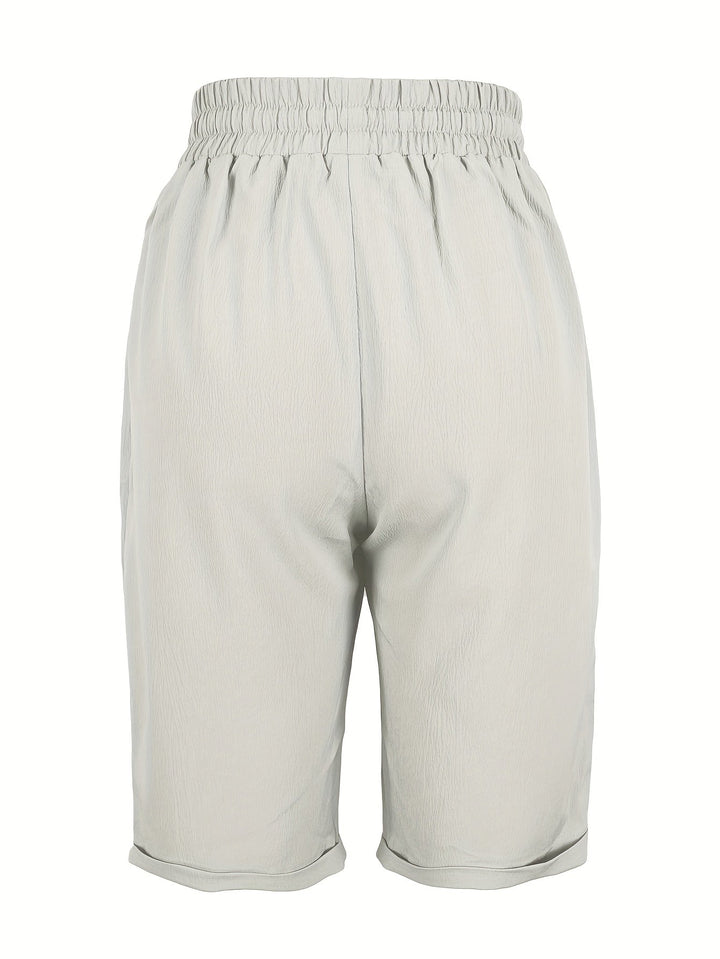 Breathable women's capri pants, relaxed silhouette, elasticated waist for a comfortable, casual look.