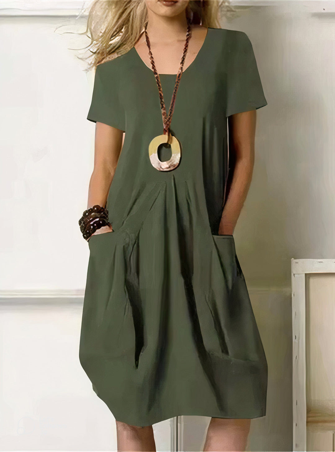 Women's relaxed fit casual dress for everyday wear. Comfortable and versatile summer day dress with a flattering silhouette.