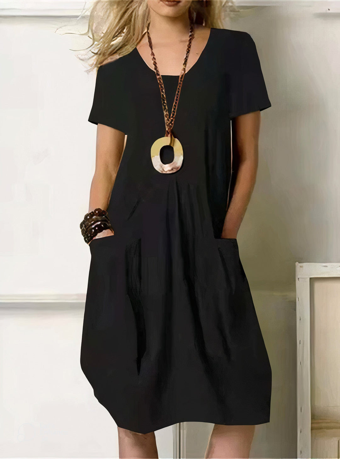 Comfortable women's relaxed fit day dress, ideal for versatile everyday wear. Soft, easy-care fabric, perfect for summer.