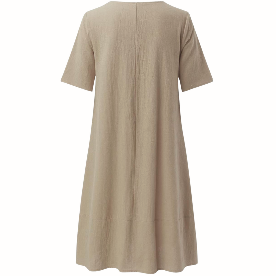 Classic relaxed fit women's casual dress. Comfortable, versatile day dress with side pockets, great for everyday summer fashion.
