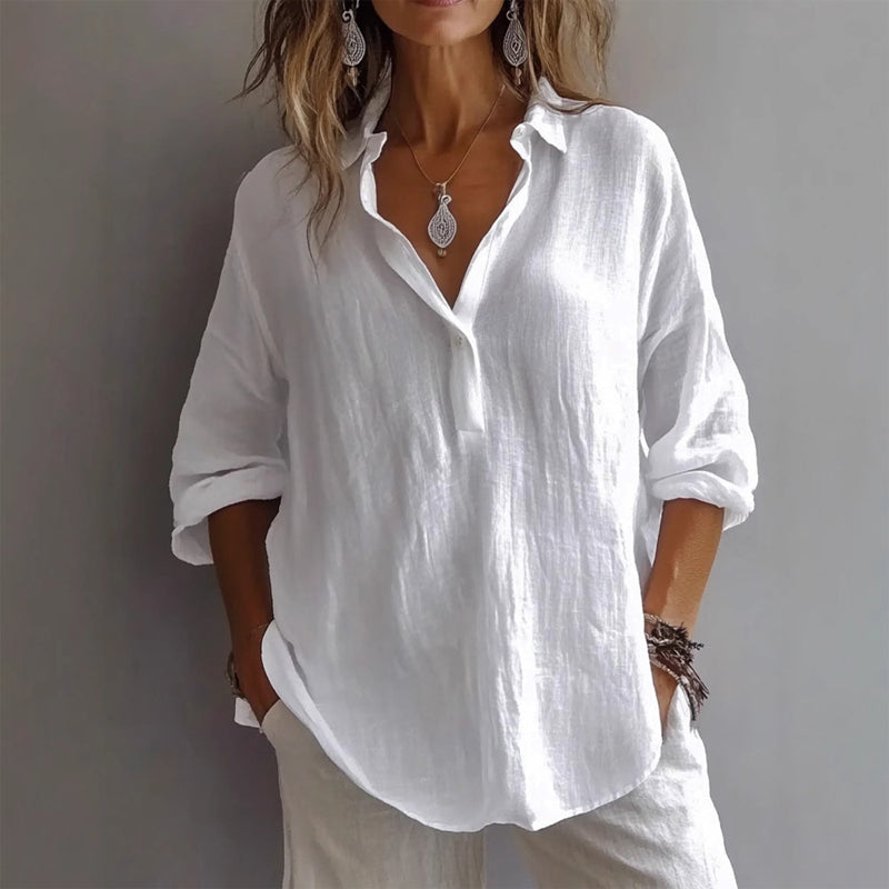 Women's relaxed fit casual white shirt. Lightweight half-placket button-down for effortless everyday summer style.