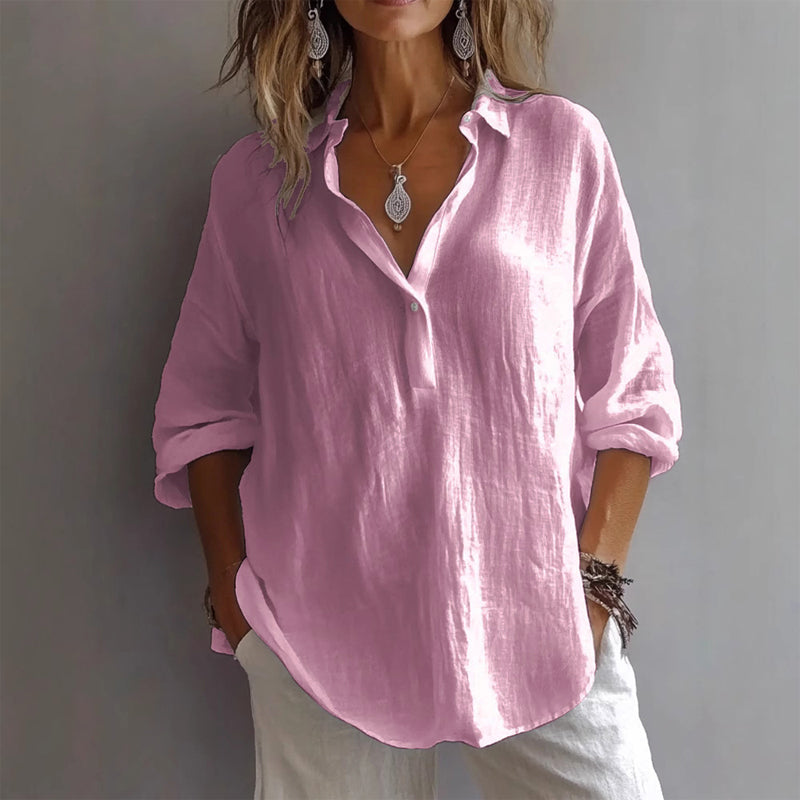 Pink women's relaxed casual shirt with a stylish half-placket. Ideal light button-down for summer and everyday wear.