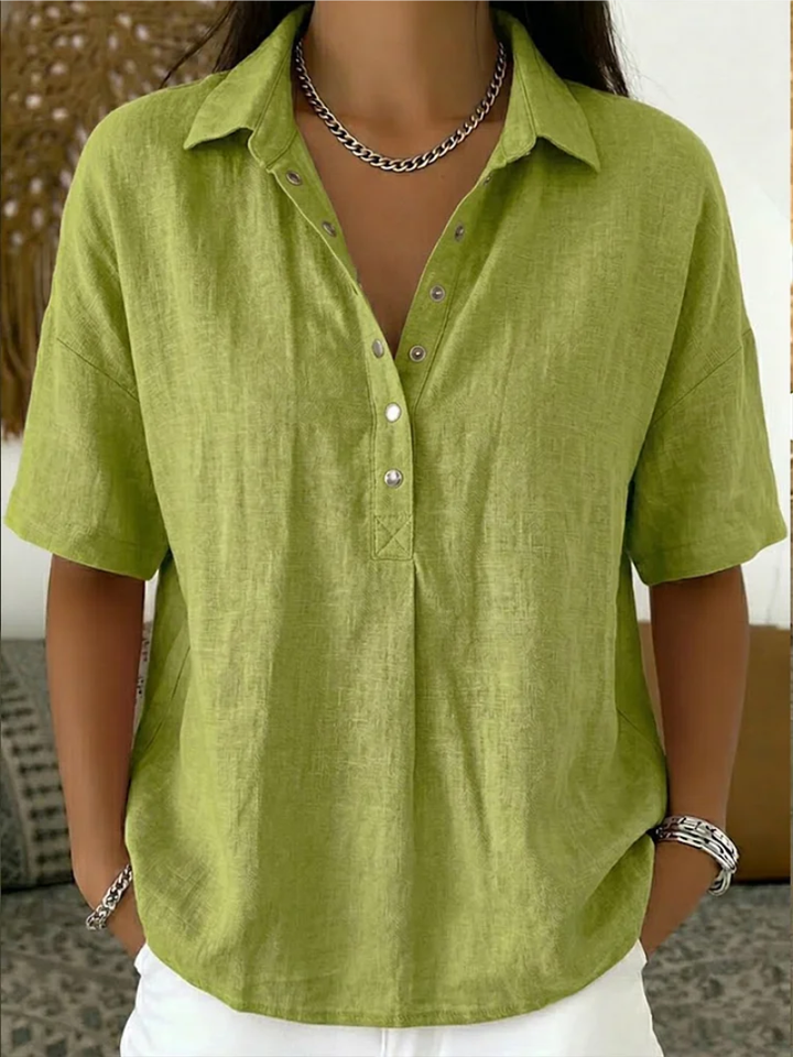 Comfortable women's short sleeve collared top, ideal for everyday wear & modern fashion.