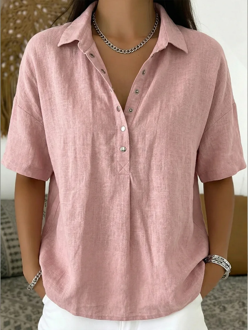Chic women's relaxed fit blouse with front buttons, great for layering or standalone style.