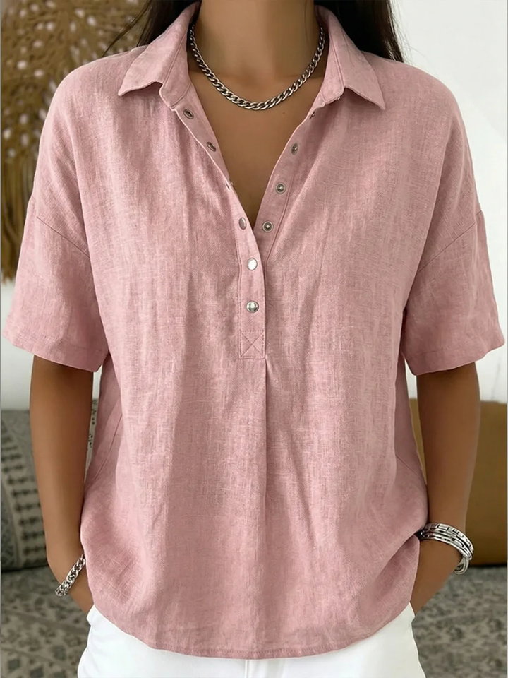 Chic women's relaxed fit blouse with front buttons, great for layering or standalone style.