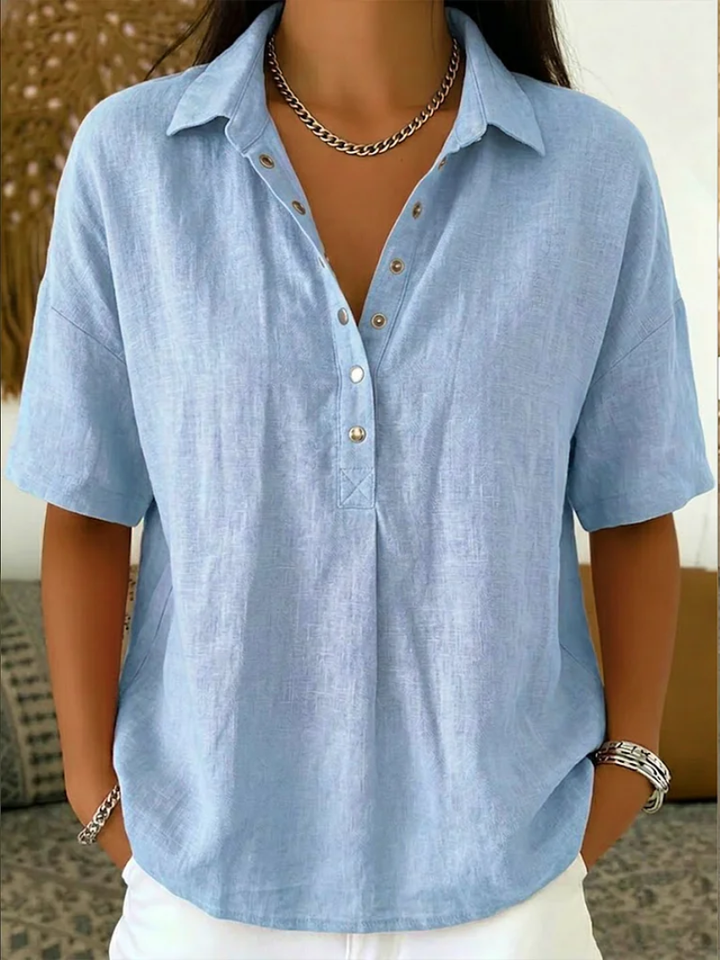 Stylish women's button-down collared shirt in a relaxed fit, offering effortless comfort.