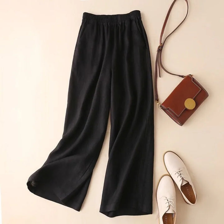 Elegant women's wide leg linen blend pants. Comfortable, versatile relaxed fit trousers for summer and casual wear.