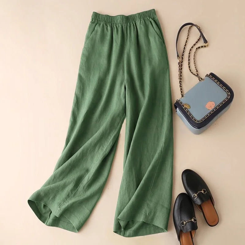 Model wearing women's relaxed fit cotton linen blend wide leg trousers, ideal for chic and comfortable summer outfits.