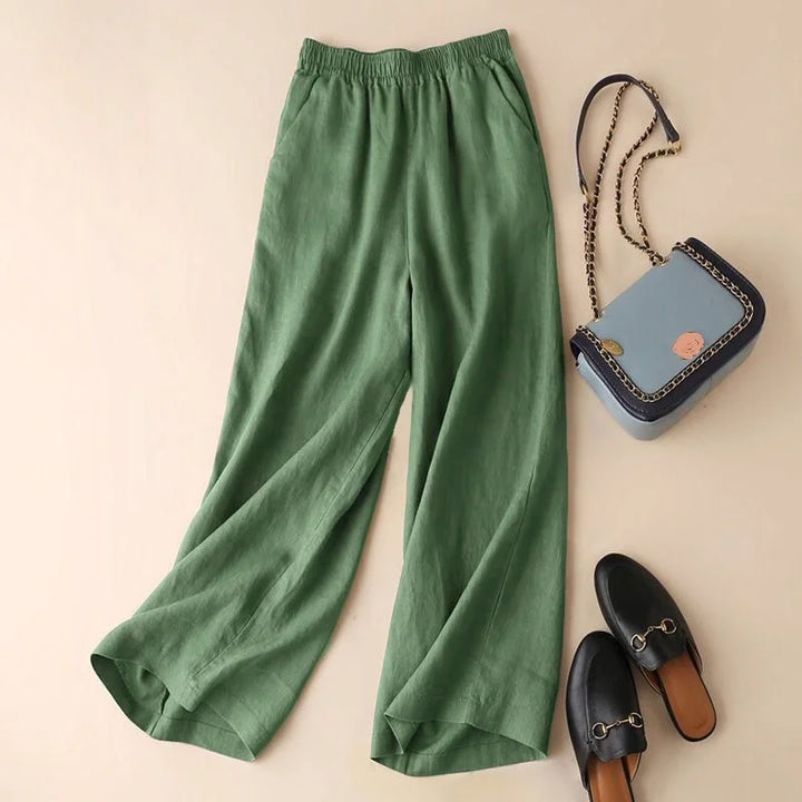 Model wearing women's relaxed fit cotton linen blend wide leg trousers, ideal for chic and comfortable summer outfits.