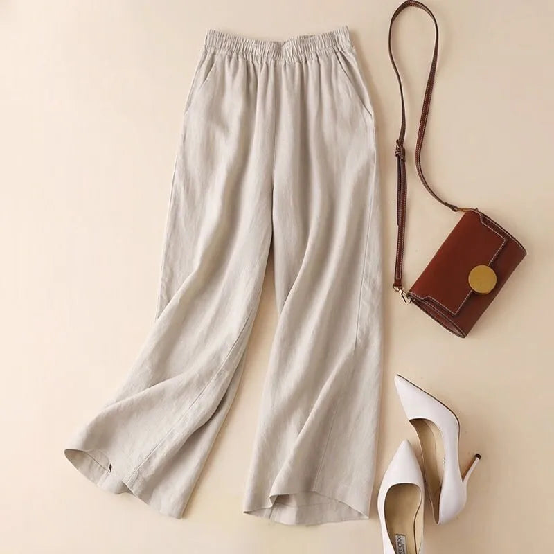 Soft cotton linen blend women's trousers featuring a relaxed, wide leg fit for comfortable and stylish summer wear.