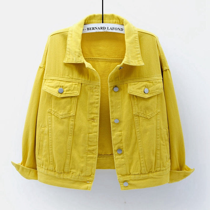 Classic women's denim jacket, relaxed silhouette, essential for everyday casual fashion.
