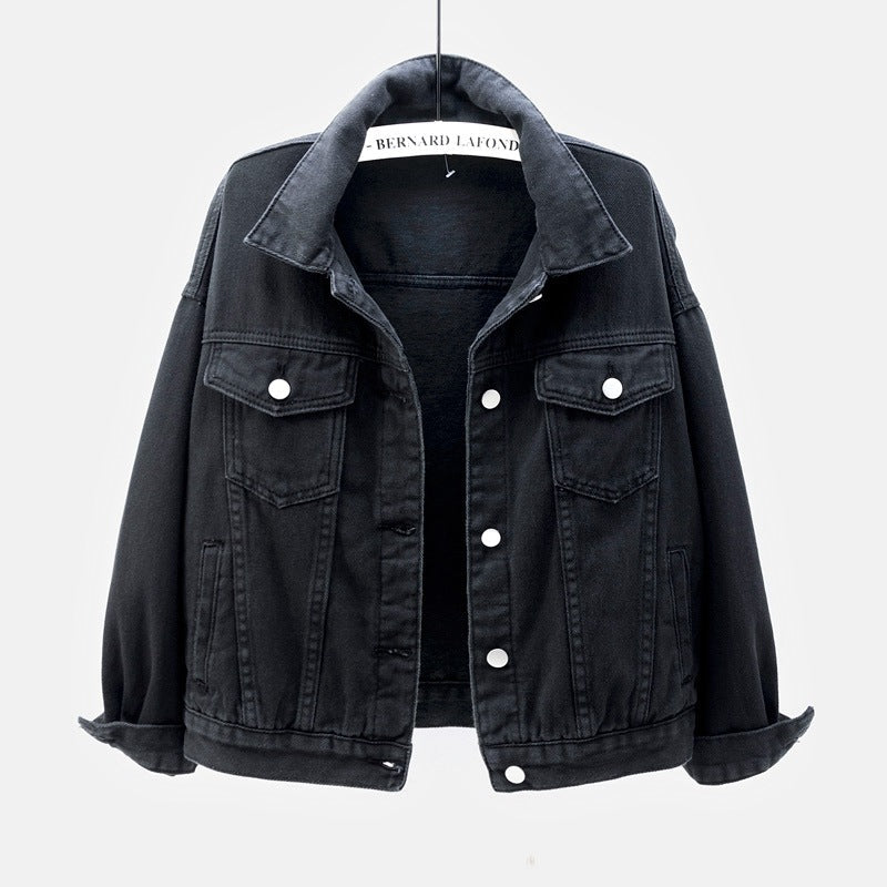 Comfortable women's relaxed-fit denim jacket, great for casual layering & fashion style.