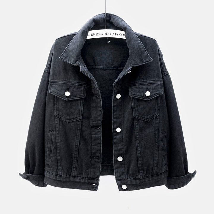 Comfortable women's relaxed-fit denim jacket, great for casual layering & fashion style.