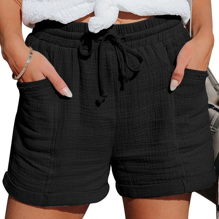 Comfy women's relaxed fit shorts with adjustable drawstring & useful pockets for lounging or errands.