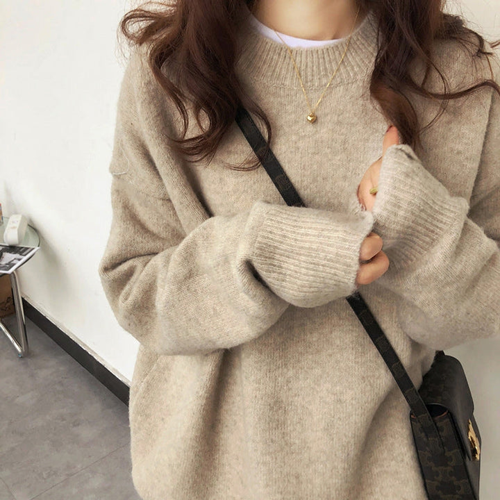Women's relaxed fit drop shoulder pullover sweater in a soft, comfortable knit, perfect for casual everyday wear.