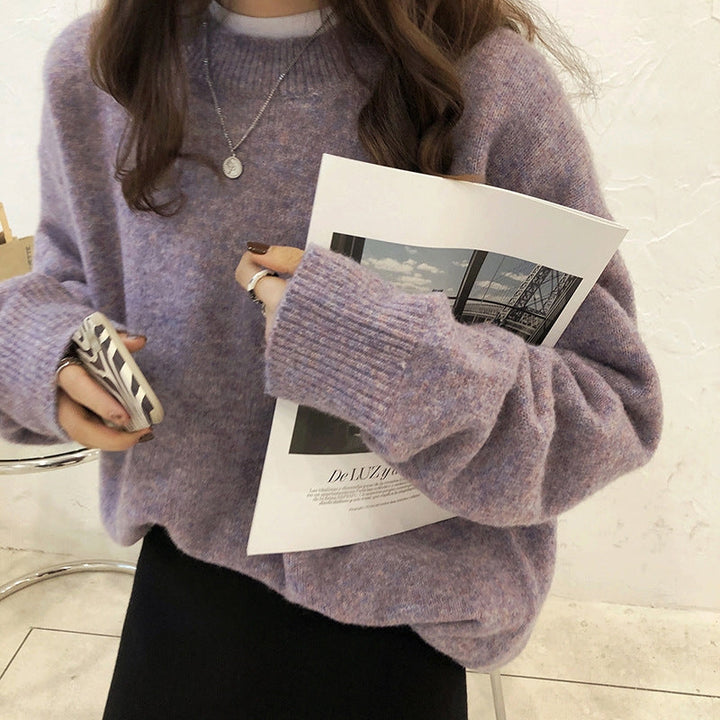 Soft & durable women's relaxed fit pullover sweater with drop shoulders, designed for ultimate comfort and everyday wear.