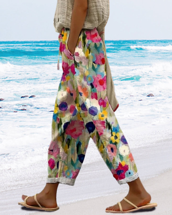 Boho style women's relaxed floral print pants. Comfortable patterned trousers for summer fashion & vacation wear.