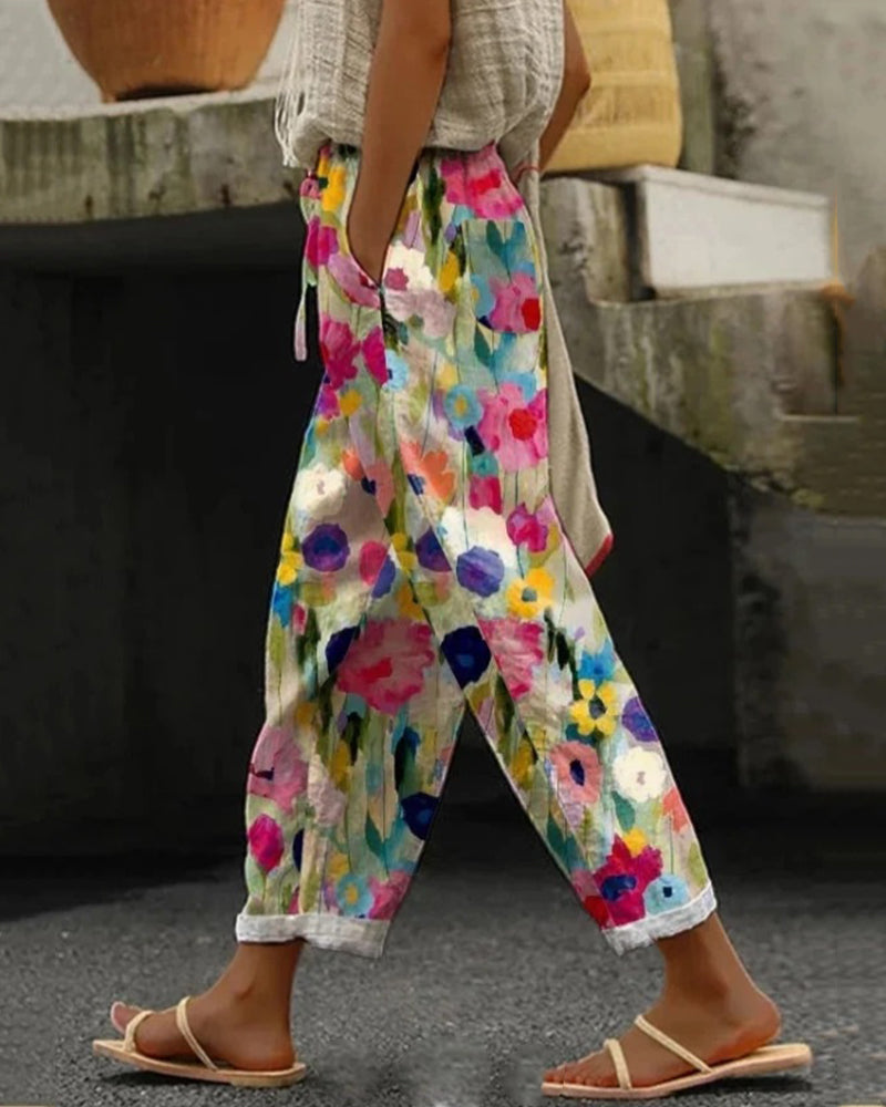 Stylish women's relaxed fit floral print casual pants. Perfect patterned trousers for comfortable summer & travel.