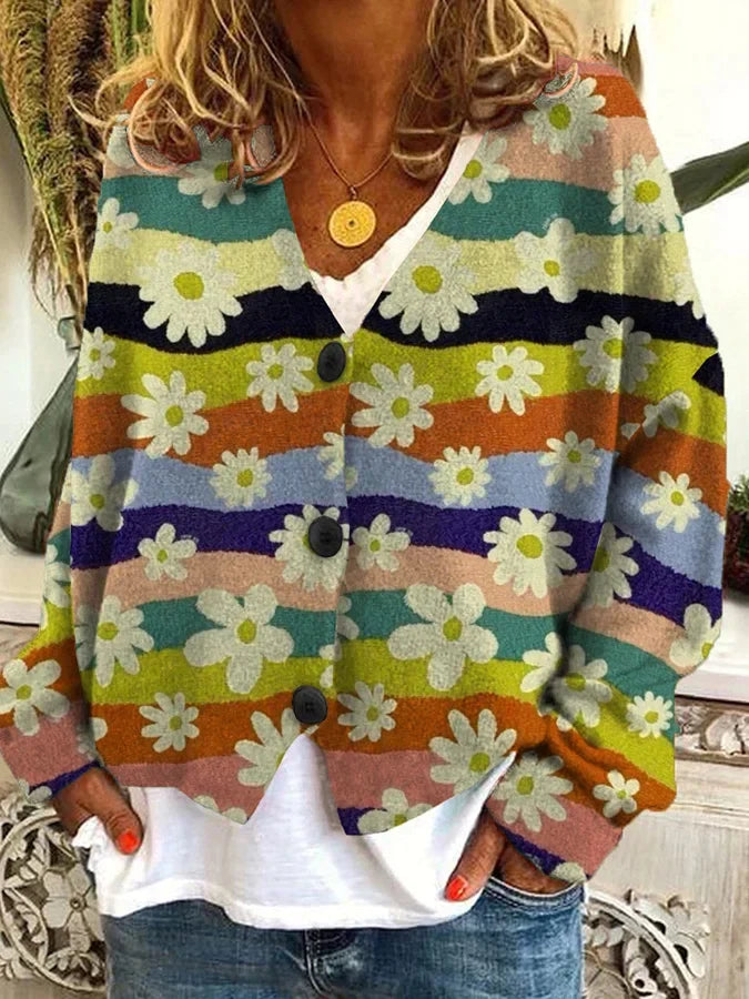 Women's relaxed fit knit cardigan with vibrant floral and stripe pattern. Button-up for a stylish casual look.