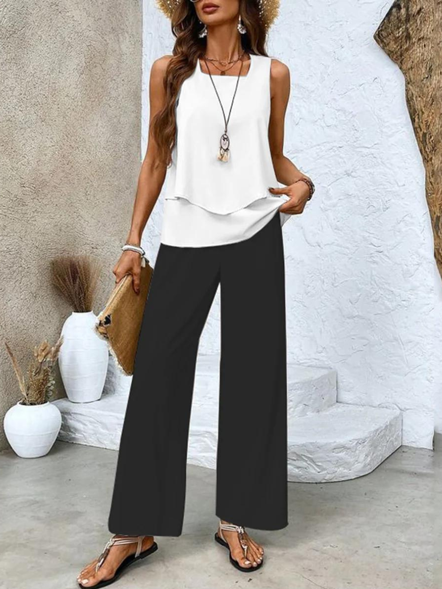 Stylish women's comfortable flowy pants and tank top 2-piece set, perfect for summer vacation or loungewear.
