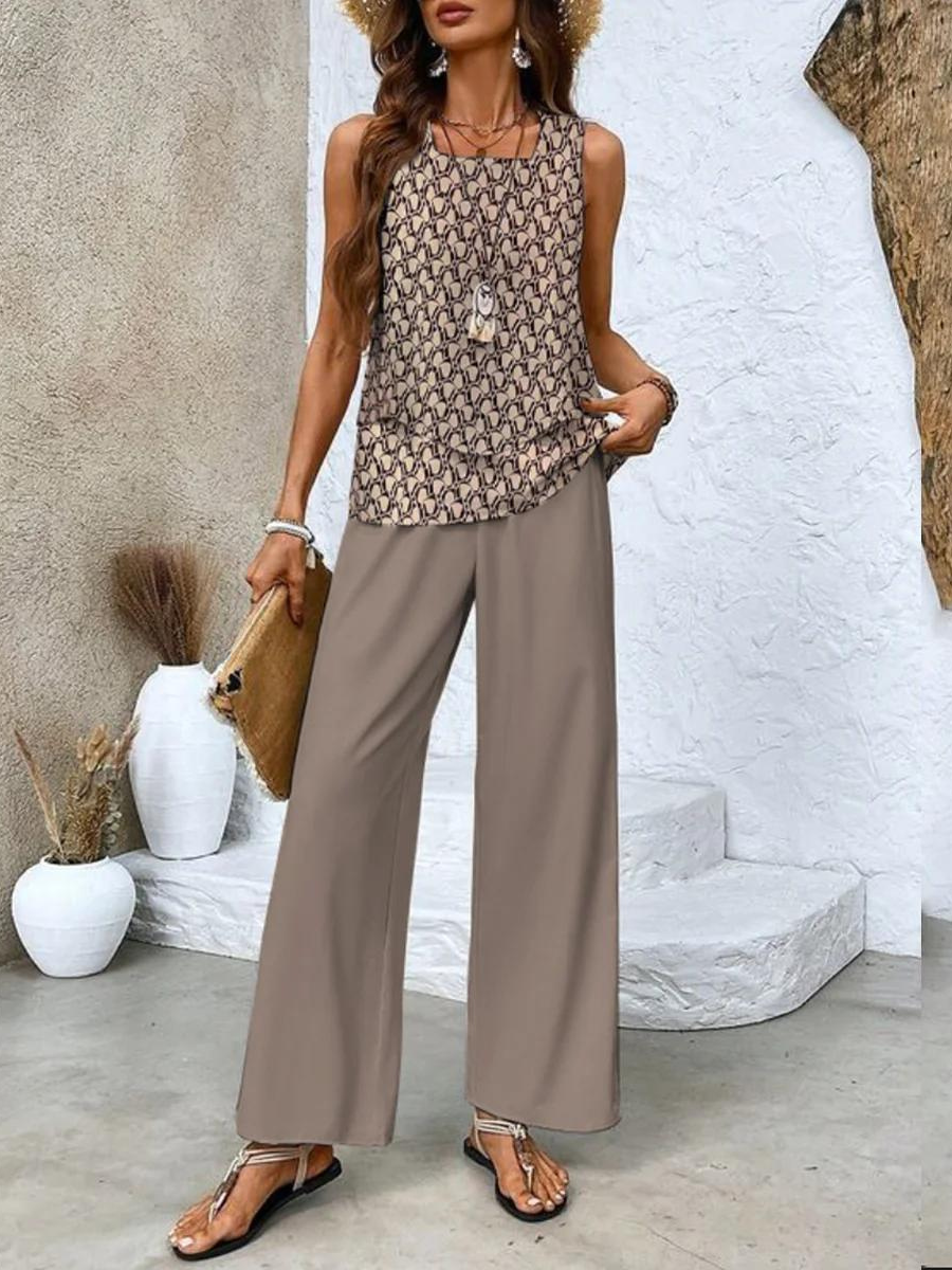 Fashionable women's sleeveless tank top & wide leg flowy pants matching set. Relaxed fit for ultimate comfort.