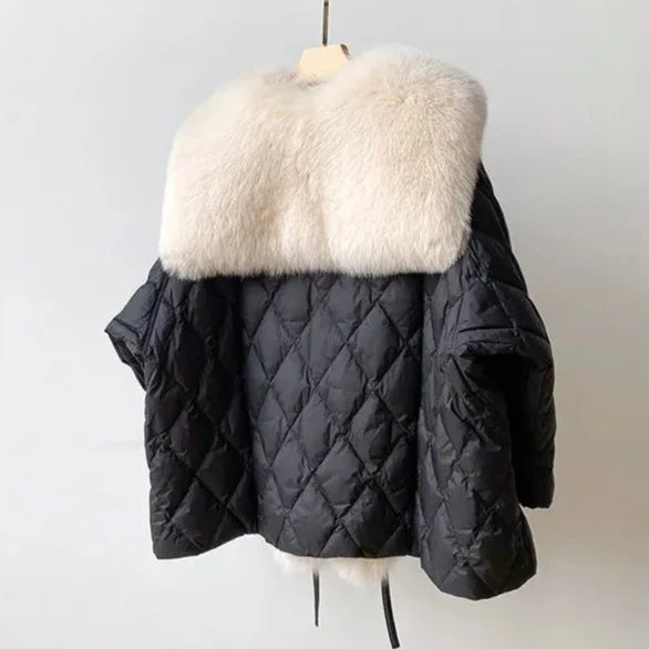 Model wears versatile women's relaxed fit jacket with fur collar. Stylish fall fashion layering piece for cozy comfort.
