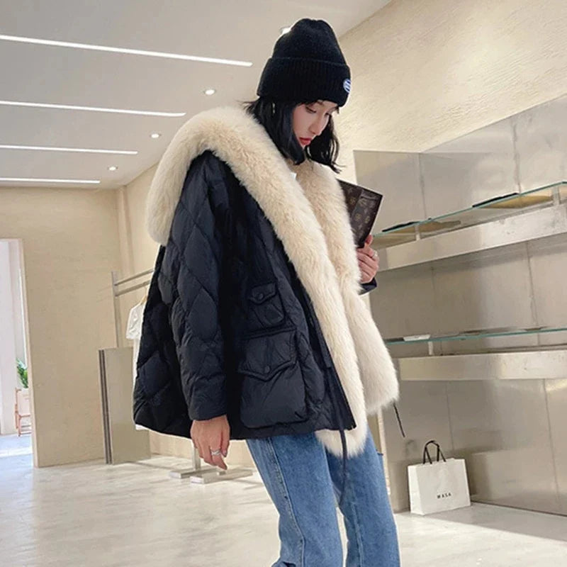 Luxurious women's fur collar jacket, designed for warmth and style. Relaxed fit, long sleeve outerwear for cold weather.