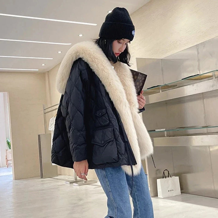 Luxurious women's fur collar jacket, designed for warmth and style. Relaxed fit, long sleeve outerwear for cold weather.