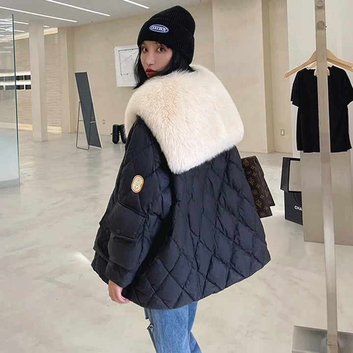Stylish women's fur collar jacket completing an elegant fall outfit. Versatile, relaxed fit layering piece for warmth.