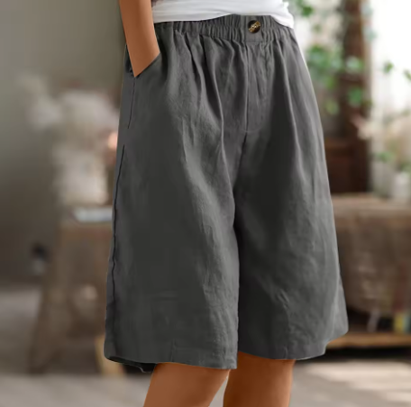 Comfortable high-waisted Bermuda shorts for women, featuring a relaxed fit and soft fabric.
