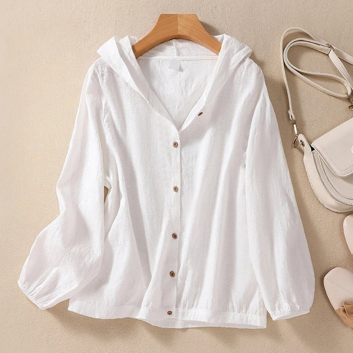 Women's relaxed fit hooded shirt in a soft fabric for effortless comfort and casual everyday style.