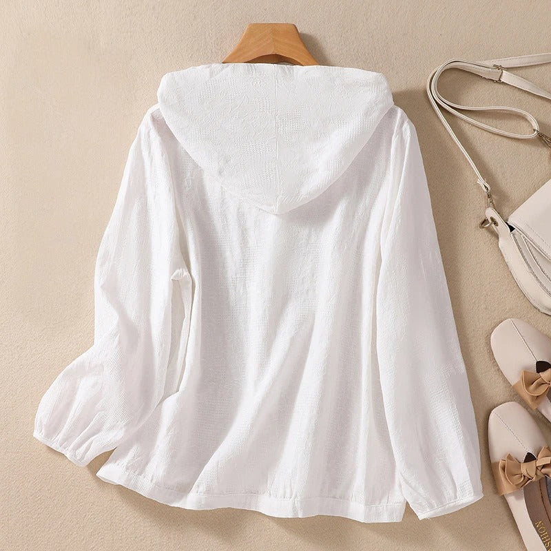 Comfortable long-sleeve hooded shirt for women. Relaxed fit blouse, perfect for everyday casual styling.
