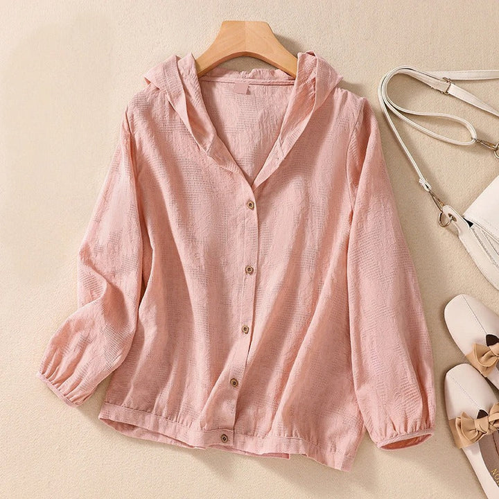 Soft, comfortable women's relaxed fit hooded shirt, an essential for casual spring fashion and layering.